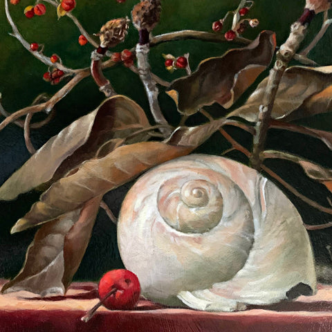 Detail of Still life oil painting of branches of magnolia leaves with a nautilus shell and crabapples on a red table cloth with a dark green background by Davette Leonard - Cottage Curator - Sperryville VA Art Gallery