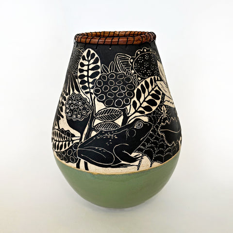 Black and white ceramic vessel with pine needle rim and green glazed base featuring a sgraffito scene of plants, frogs and butterflies by Carolyn Blazeck at Cottage Curator - Sperryville VA Art Gallery