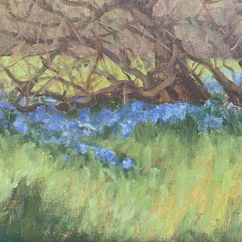 Detail of Oil painting of landscape with budding tree and blue wildflowers in the foreground with forest behind by Kathy Chumley at Cottage Curator - Sperryville VA Art Gallery