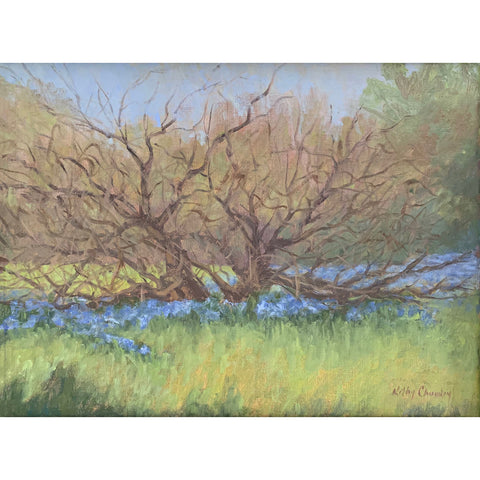 Oil painting of landscape with budding tree and blue wildflowers in the foreground with forest behind by Kathy Chumley at Cottage Curator - Sperryville VA Art Gallery