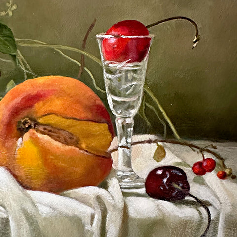 Detail of a still life painting with a cut peach, cherries and stems of lobelia arranged on a white tablecloth against an olive green background by Davette Leonard at Cottage Curator - Sperryville VA Art Gallery
