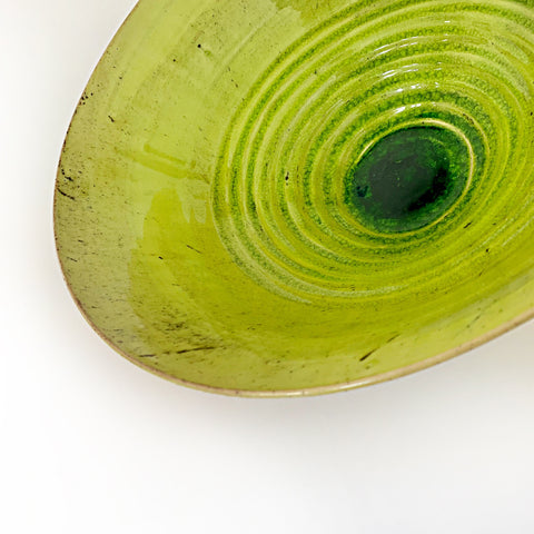 Ceramic bowl with lime green interior and white/tan exterior with drops of green running over the edges from the interior by Virginia Rood Pates at Cottage Curator - Sperryville VA