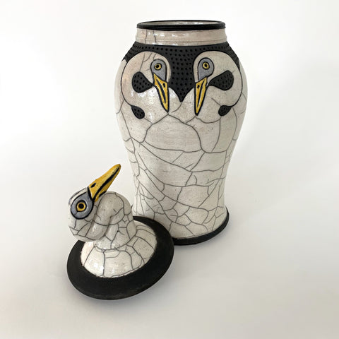 View of Raku black, white, gray and yellow stoneware vessel with egrets and lid (off) in the shape of an egret by Robin Rodgers at Cottage Curator - Sperryville VA Art Gallery