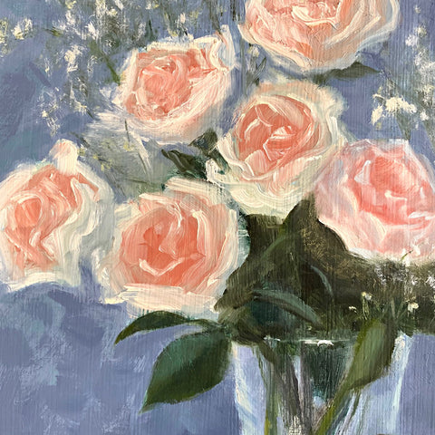 Detail of roses in still life painting of pink roses with baby's breath in a glass vase on white tabletop with a blue background and plant mister in the foreground by Kathy Chumley at Cottage Curator - Sperryville VA Art Gallery
