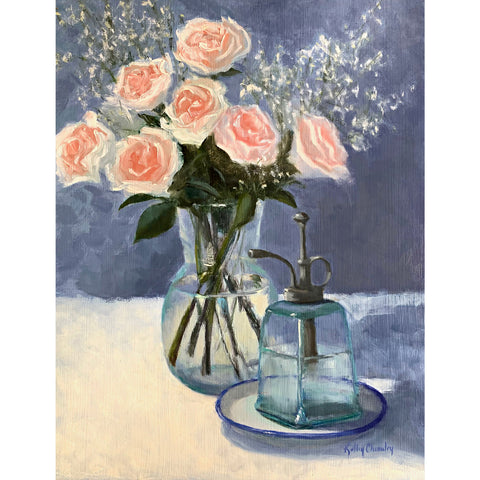 Still life painting of pink roses with baby's breath in a glass vase on white tabletop with a blue background and plant mister in the foreground by Kathy Chumley at Cottage Curator - Sperryville VA Art Gallery