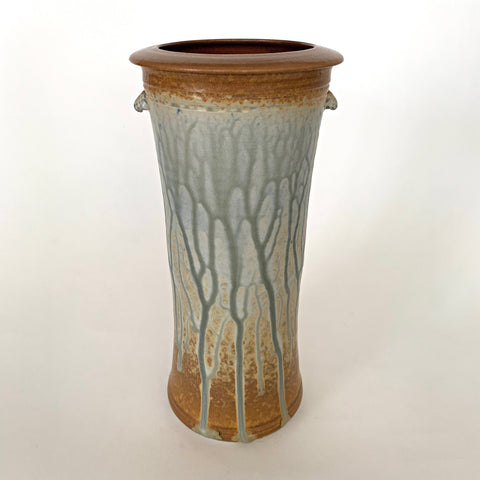 Cylindrical vessel with two small handles and gray and tan wood ash glazing by Richard Aerni at Cottage Curator - Sperryville VA Art Gallery