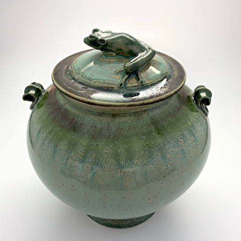 Green ceramic vessel with tree frog perched on top of lid by Richard Aerni at Cotttage Curator - Sperryville VA Art Gallery