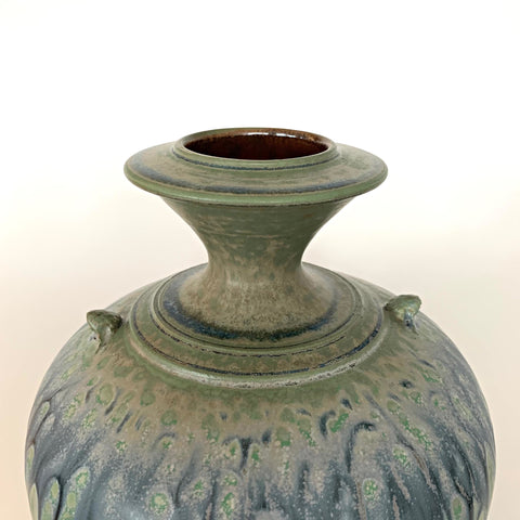 Stoneware ceramic vessel with two small handles and tapered neck with blue green glaze by Richard Aerni at Cottage Curator - Sperryville VA Art Gallery