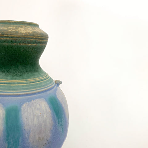 Detail of Symmetrical ceramic vessel with green upper and lower glazing and a center with blue and turquoise pattern with small handles by Richard Aerni at Cottage Curator - Sperryville VA Art Gallery