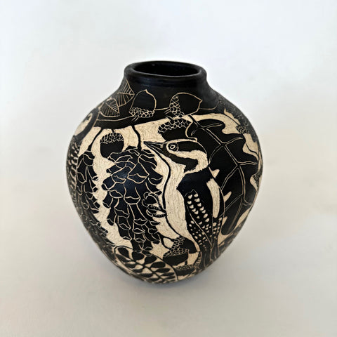 Black and white ceramic vessel featuring a sgraffito scene with acorns and three woodpeckers by Carolyn Blazeck at Cottage Curator - Sperryville VA Art Gallery