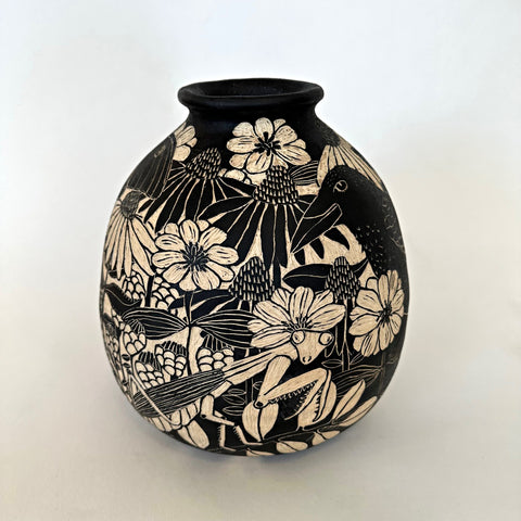 Black and white ceramic vessel with sgraffito scene featuring a crow, blackbird and various butterflies and insects by Carolyn Blazeck at Cottage Curator - Sperryville VA Art Gallery