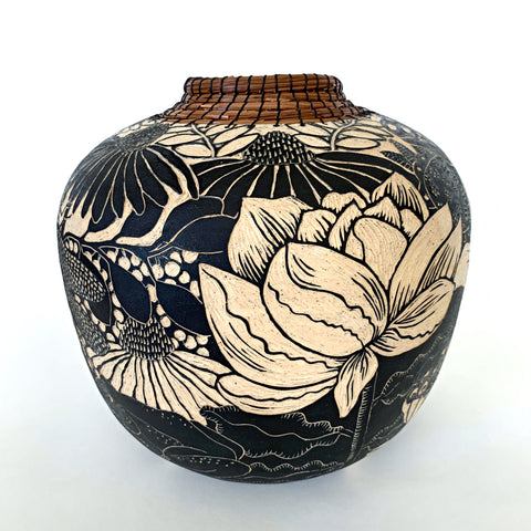 Black and white terra sigillata stoneware vessel with sgraffito carvings of blackbird, lotus and dragonfly with pine needles woven around neck of vase by Carolyn Blazeck at Cottage Curator - Sperryville VA Art Gallery