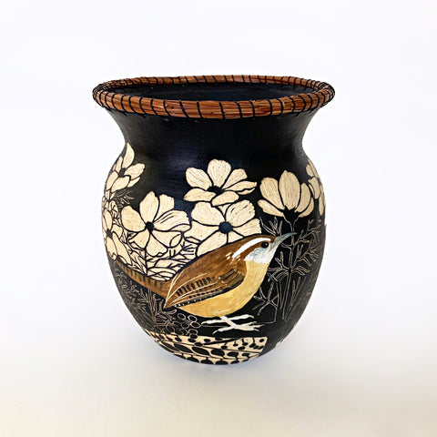 Black and white ceramic vessel with portrait of a carolina wren surrounded by plants in sgraffito with pine needles sewn around the rim by Carolyn Blazeck at Cottage Curator - Sperryville VA Art Gallery