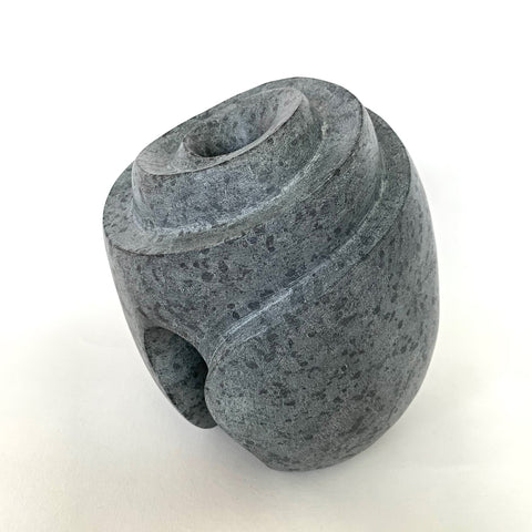 Gray soapstone sculpture resembling a hive with hole in the top center by Robert Bouquet at Cottage Curator - Sperryville VA Art Gallery