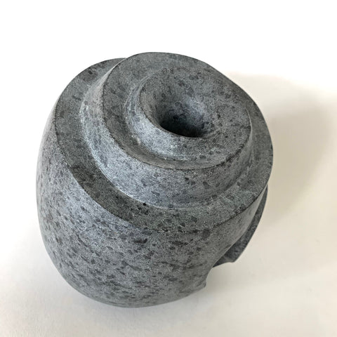 Gray soapstone sculpture resembling a hive with hole in the top center by Robert Bouquet at Cottage Curator - Sperryville VA Art Gallery
