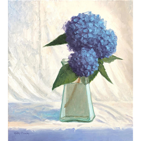 Still life painting of a vase of blue hydrangeas on a tabletop with white cloth background by Kathy Chumley at Cottage Curator - Sperryville VA Art Gallery
