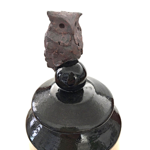 Detail of Ceramic vessel with leaf print and owl topper by Suzanne Crane at Cottage Curator, Sperryville VA Art Gallery