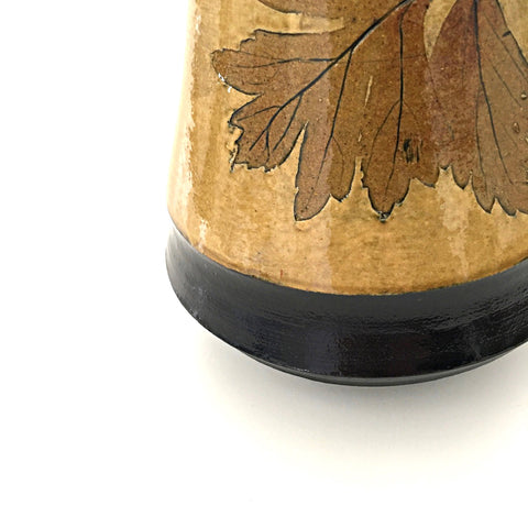 Detail of Ceramic vessel with leaf print and owl topper by Suzanne Crane at Cottage Curator, Sperryville VA Art Gallery