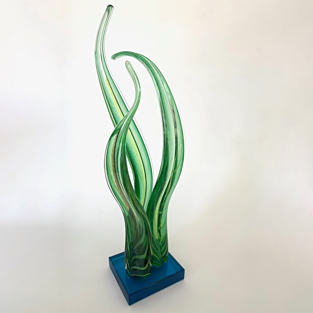 Green blown-glass sculpture of river grass with blue base by Neil Duman at Cottage Curator - Sperryville VA Art Gallery 