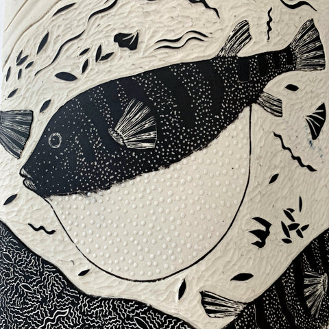 Detail of Porcelain vase with black and white carving of blowfish by Shirley Gromen at Cottage Curator - Sperryville VA Art Gallery
