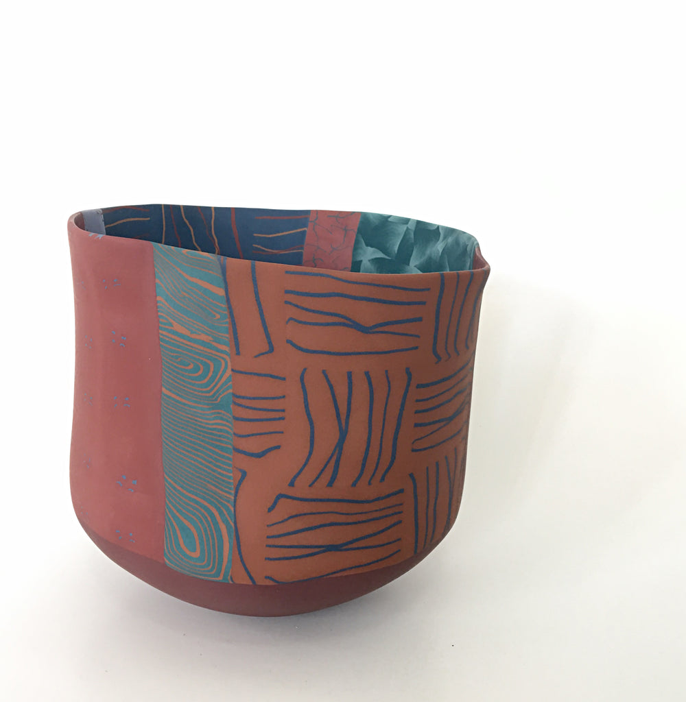 Colorful Nerikomi bowl with varying patterns by Thomas Hoadley