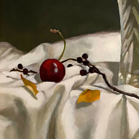Detail of cherry in Still life painting with sunflowers in a vase on white tablecloth against a dark background with bittersweet vine and cherries by Davette Leonard at Cottage Curator - Sperryville VA Art Gallery