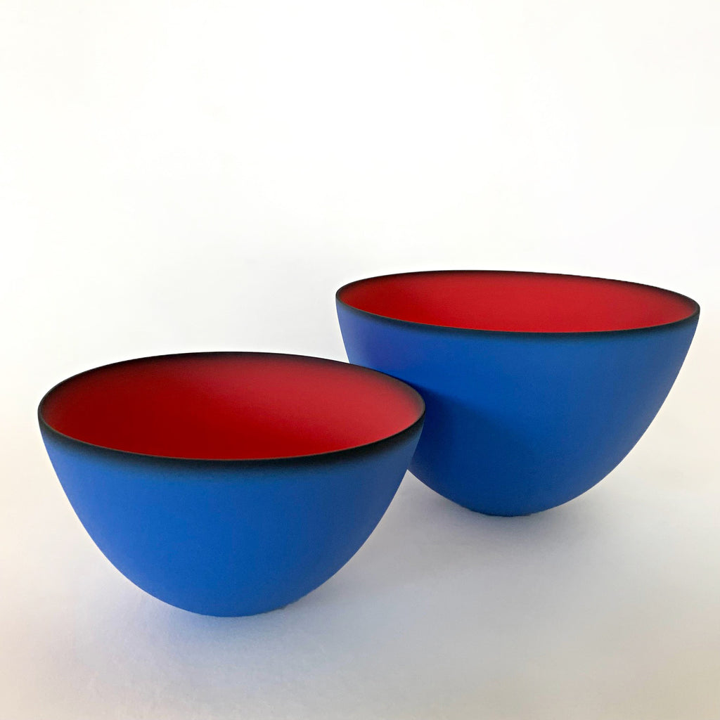 Pair of bowls, one small and one larger, with royal blue exterior and red interior, made of earthenware by Thomas Marrinson at Cottage Curator - Sperryville VA Art Gallery