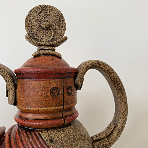 Detail of Red/orange clay teapot with mechanical, steampunk style by Steve Palmer at Cottage Curator - Sperryville VA Art Gallery