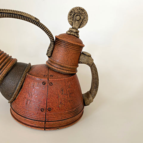 Detail of brown/orange clay teapot with mechanical, steampunk style by Steve Palmer at Cottage Curator - Sperryville VA Art Gallery