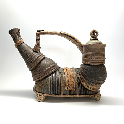 Ceramic teapot that appears to be made of jointed metal pieces by Steve Palmer at Cottage Curator art gallery in Sperryville Virginia