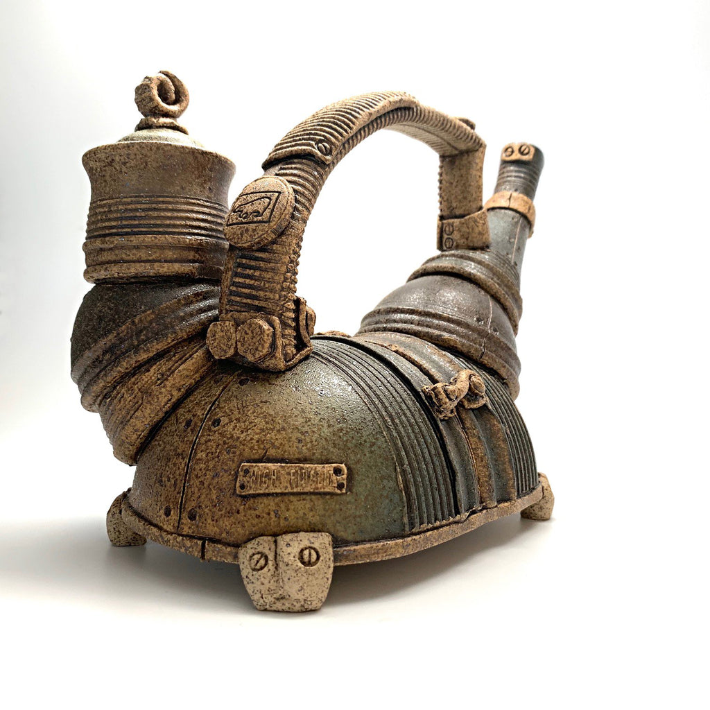 Ceramic teapot that appears to be made of jointed metal pieces by Steve Palmer at Cottage Curator art gallery in Sperryville Virginia