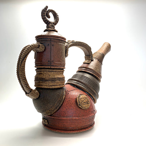 Ceramic teapot that appears to be made of jointed metal pieces by Steve Palmer at Cottage Curator art gallery in Sperryville Virginia