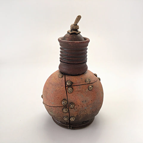 Industrial ceramic vessel with rivets by Steve Palmer