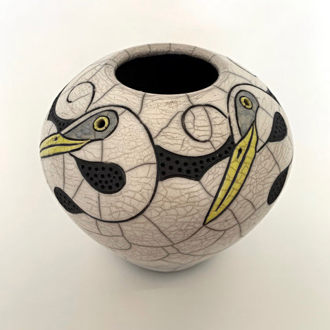 Wheel Thrown, carved, raku clay vessel in black, white and yellow with four egrets by Robin Rodgers at Cottage Curator - Sperryville VA Art Gallery