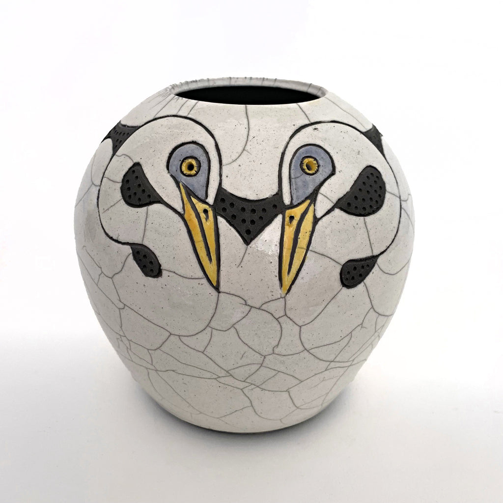 Black and white raku-fired vase with two pairs of egrets with yellow eyes and beaks by Robin Rodgers at Cottage Curator - Sperryville VA Art Gallery