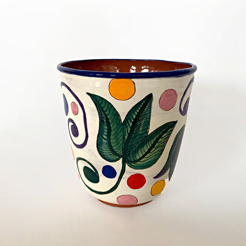 Ceramic pot with green, blue and purple plants and multi-colored polka dots with clay interior by Sara Schneidman at Cottage Curator - Sperryville VA Art Gallery