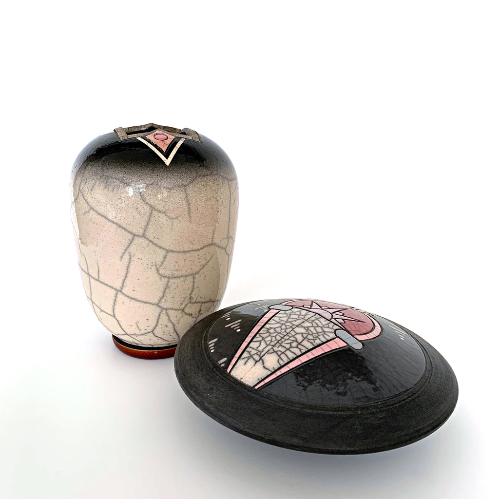 Suite of two ceramic pieces by Andy Smith - one tall vase and one short cache vessel - in black and white raku glaze with peach and pink details. Available at Cottage Curator - Sperryville VA Art Gallery
