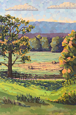 Vertical landscape of oatlands hayfield with trees and fence in the foreground and bales of hay in a field below blue skies with clouds by Joan Wiberg - Cottage Curator - Sperryville VA Art Gallery