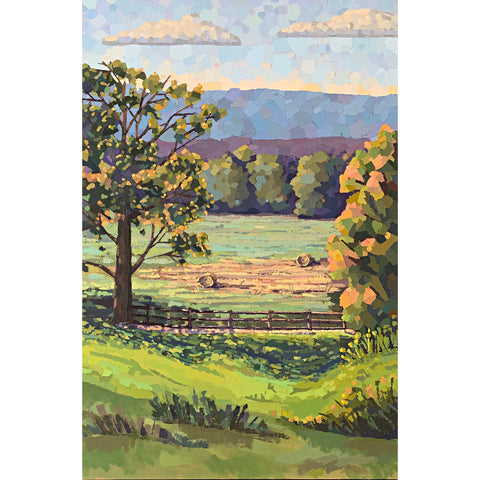 Vertical landscape of oatlands hayfield with trees and fence in the foreground and bales of hay in a field below blue skies with clouds by Joan Wiberg - Cottage Curator - Sperryville VA Art Gallery