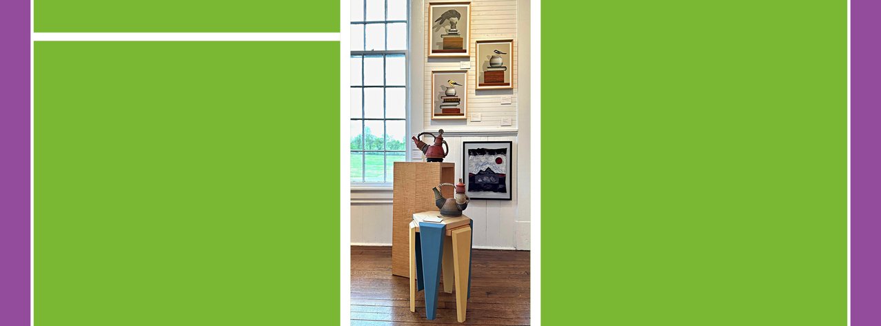 Gallery view with teapots, tables and paintings